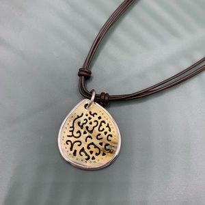 Silpada Retired Sterling Silver Carved Lip Shell Pendant on Brown Leather Chain